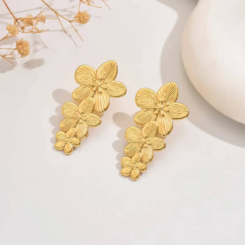 Aretes-acero-bosque-dorado-1
