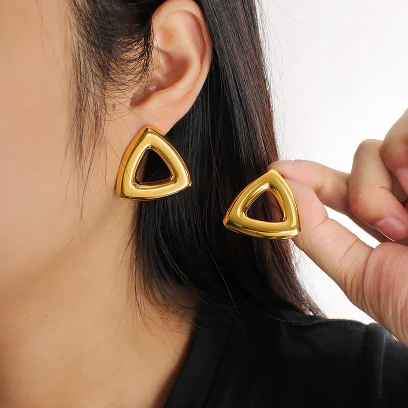 aretes-acero-prisma-dorado