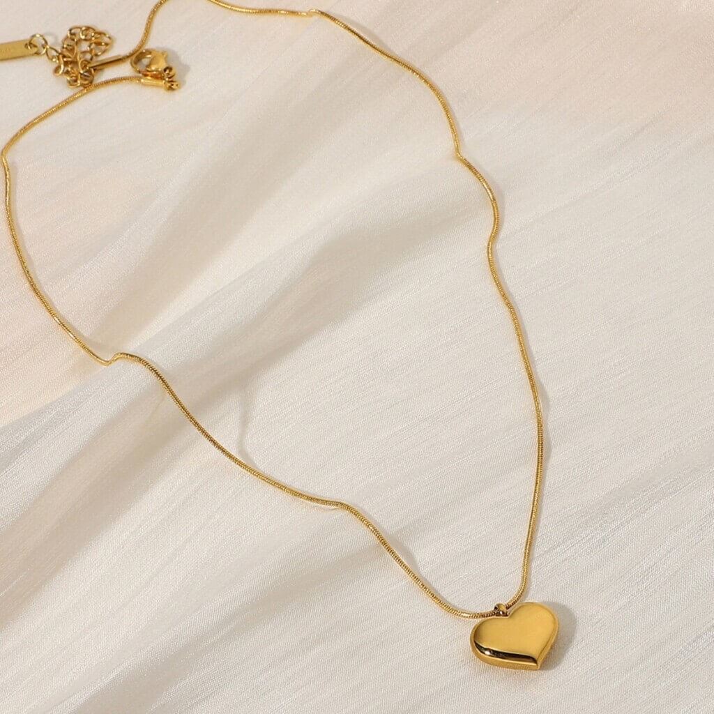 collar-acero-corazon-seda-1