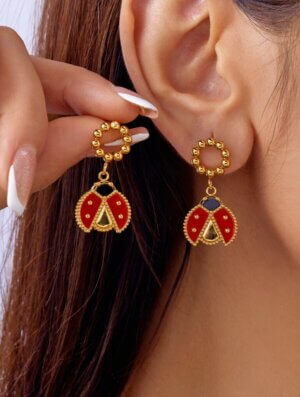 Aretes Acero Alas Rojas
