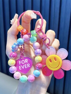 Llavero Flor Feliz Fucsia