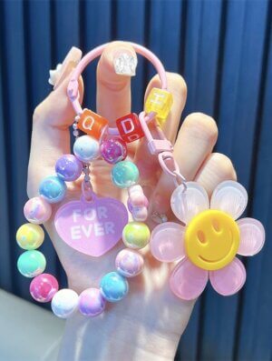 Llavero Flor Feliz Rosa