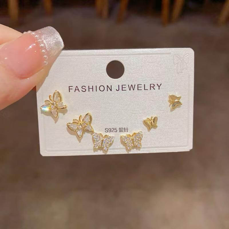 set-aretes-mujer-reflejo
